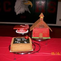 Kindergarten Graduation/k4 Program My first attempt at MMF for apple and top of hat. School house is made of cake while the roof is chocolate covered with buttercream. Time...