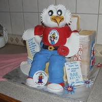 A School Mascot Sitting On A Chair Of Books! This cake was made for Teacher Appreciation Day. The school mascot is shown on the button near the eagles feet ... He was designed to look...