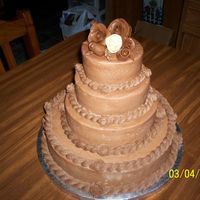 Four-Tiered Retirement Cake White almond sour cream & chocolate fudge almond sour cream cake, torted w/chocolate mousse filling, & finally smothered w/heavenly...