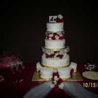 1St Paid Wedding Cake Caramel w/ BC Icing. The idea was from Wilton "Tiered Cakes" book, "Lace Flair". On the bottom are 6-6" 2 layer...