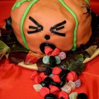 Vomiting Pumpkin My first cake for halloween. It made of 3 cakes, chocolate and hazelnut, covered with marsepan. The inside was filled with candy...