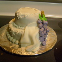 Grapes I made this for a friend who said she wanted a birthday cake that kinda looked like a wedding cake. It is covered with fondant. the...