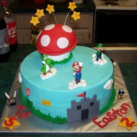 Super Mario Birthday! Vanilla cake with BC and fondant deco. The mom of the birthday boys found these perfect figures of the Mario characters. Mushroom is all...