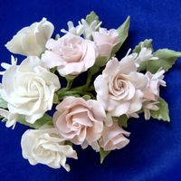 Gum Paste Rose Corsage This is a rose and stephanotis cluster I made as a display for the gum paste class I will be teaching at Michael's starting this...