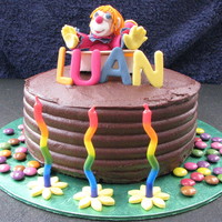Clown Birthday Cake I had so little time for this cake! Wish I had piped a border around the top.