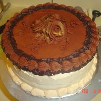 $25 Cake This was supposed to be a simple cake for $25 and I got carried away. Chocolate and vanilla cake with chocolate buttercream, vanilla french...