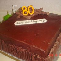 Chocolate Birthday Cake Chocolate cake with chocolate mousseline buttercream filling and ganache coating.