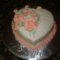 Final Cake For Class 1 the cake was small . so i had to struggle to make a place for the roses and the leaves!!!