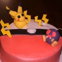 Pokemon Cake BC icing, pokemon made with fondant.