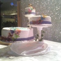 Wedding Cake And Grooms Cake cascading cake, fondant ribbon with butterlies