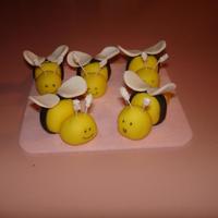 Bees Fondant bees placed on a baby shower cake.