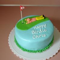 Happy Birdie Chris 9" round covered in fondant with fondant decorations. Thanks to CC for the ideas!