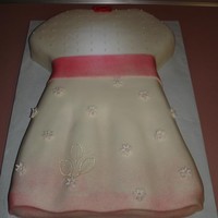 Baby Shower Carved this dress from a 12x18 and covered it in fondant. Airbrushed the bottom for effects. Used piping gel for the flower and edible...
