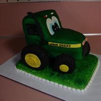 Johnnie Tractor #2 Did this cake for the Fulton County Fair. However, it didn't make it there. It shifted in the car and calapsed. I guess it was my own...