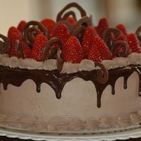 Strawberry Chocolate This is a practice cake for my sisters reception. It is a chocolate cake, chocolate whip cream frosting and chocolate glaze and swirls....