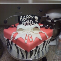 Melanies Bday Cake This is a marbled cake with BC covered in pink fondant with a zebra border on the bottom. Nothing too fancy she just wanted simple for her...