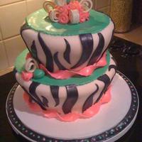 Zebra zebra inspired cake for a frined with fondant. She loved it and was super surprised.