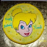 Tinkerbell birthday cake of Tinkerbell, hand drawn and decorated in buttercream