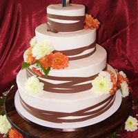 Chocolate Stripes This cake was such a challenge. The cake is buttercream and the ribbons are made from chocolate fondant.