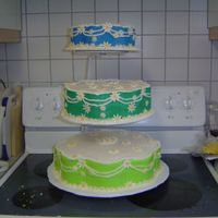Summer Wedding Cake This cake I did for my daughters German teacher's wedding. Not the colors that I would want but she loved it.