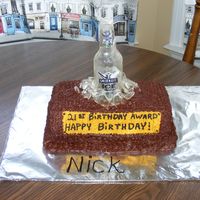 Beer Bottle Trophy Cake beer bottle trophy cake made for our sons 21st birthday.