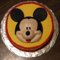 Mickey Mouse Cake This is a chocolate cake. Mickeys face was made out of fondant