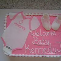 Baby Shower Girl Cake Chocolate cake BC frosting. Fondant booties .