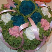 100_1018.jpg This was the top tier for a cupcake wedding cake. Enjoy