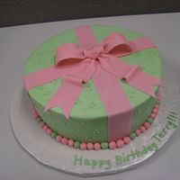 Green & Pink Cake Green & Pink Cake with buttercream icing and fondant accents.. strawberry shortcake with strawberry filing