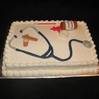 Nurse's Graduation Everything was handmade from fondant and gumpaste:)