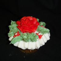 Christmas Cupcakes I made coordinating cupcakes for people at work last Christmas..this is a picture of one of them.