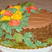 Thanksgiving Basketweave Cake This was the first cake I decorated--red velvet with buttercream :) Some of the ivy was gumpaste that I bought from a store.