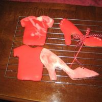 Red Shoe And Shirt Toba Garrentt's Butter Cookie and Glace' Icing. Really like her recipes. Tried marble effect. The camera flash made the color...
