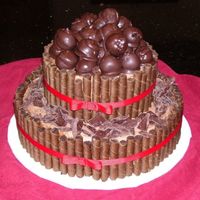 Copy_Of_100_1061.jpg Chocolate Oreo Truffle cake, with wafer walls.