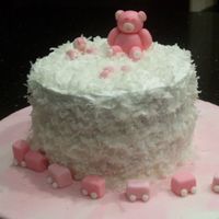 Copy_Of_100_1040.jpg Lemon Coconut cake with sugar paste bear, blocks with shimmering ABC letters and a simple cute sugar paste toy train.