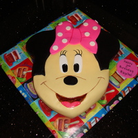 Minnie Mouse Minnie Mouse Cake for a Birthday celebration.