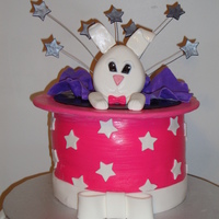 Rabbit In A Hat Rabbit coming out of a hat for a 16th Birthday. The birthday girl is also a field hockey player, added a small field hockey stick.