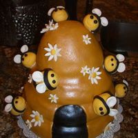 Beehive Cake My second fondant cake all made with MMF and a light dusting of yellow luster dust on hive.