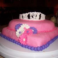 Pink Fondant Tiara Cake This is my very first attempt with MMF and I was very surprised at how it turned out. It was also my first attempt working with royal icing...