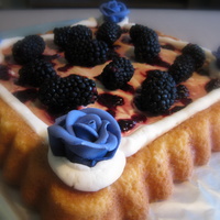 2Nd Anniversary - Fresh Fruit White chocolate cake, pomegranate molasses, blackberry preserves, fresh blackberries, buttercream. Gumpaste roses copied from the couple&#...