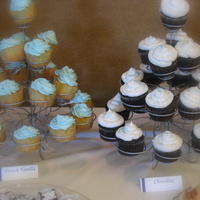 Cupcake Towers Part of the dessert table for a baby shower. Buttercream with sugar pearls and blue sanding sugar.