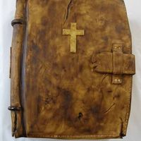 Holy Bible The holy bible 30 cm X 25 cm.White g&Atilde;&copy;noise with chocolate buttercream the brown leather effect is done with a sponge...