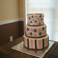 Pink/brown Cake dummies covered in fondant with fondant decorations