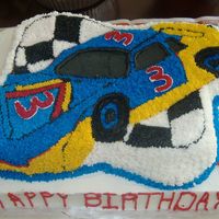 Nascar i made this cake for my son's 3rd birthday. the car cake is white chocolate and the sheet cake is marble chocolate and vanilla.
