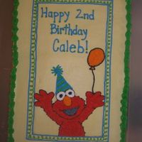 Elmo! 1/2 sheet, Elmo! Butter yellow cake with buttercream frosting.