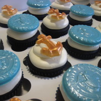 Navy Cupcakes With Chocolate Toppers 