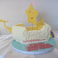 Care Bear Cloud Ship Cake Cloud ship from the Care Bears Movie. Banana cake with cream cheese filling and SMBC frosting and fondant accents.