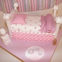 Little Girls Bed Cake This was for a cake class I attended, which we had to make a bed. It was up to us how we did it. Everything except the little teddy is made...