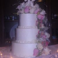 Flowers And Beads 6,8,10...buttercream, cherry almond filling. fresh flowers, perls and crystals.