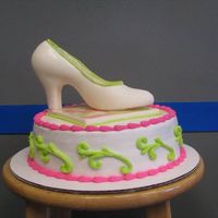 Shoe On 9 Inch 9 Inch Chocolate WASC recipe with white chocolate shoe and platform and #4pearls. What would you charge for this cake? I undercharged at $...